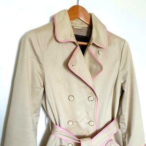 LIKE NEW Coach tan trench coat with pink lining
